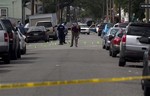 New Orleans Police investigate shooting at the intersection Frenchman Street at N. Villere on Mother's Day in New Orleans, Sunday May 12, 2013.