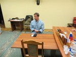 In this handout photo provided by the FSB, acronym for Russian Federal Security Service, a man claimed by FSB to be Ryan Fogle, a third secretary at the U.S. Embassy in Moscow, sits in the FSB offices in Moscow, early Tuesday, May 14, 2013.