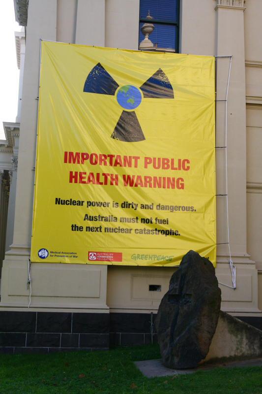 No-nukes banner on wall of Trades Hall