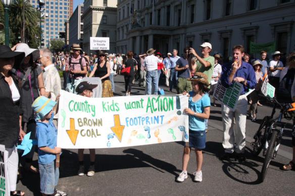 Children with banner - 'Country kids want action!'