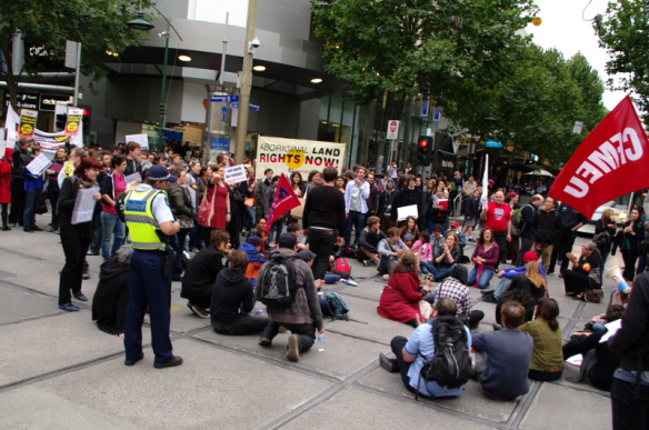 The march occupies the intersecttion for a sitdown