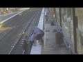 Dramatic footage: Trainee nurse saves man from train track in Australia