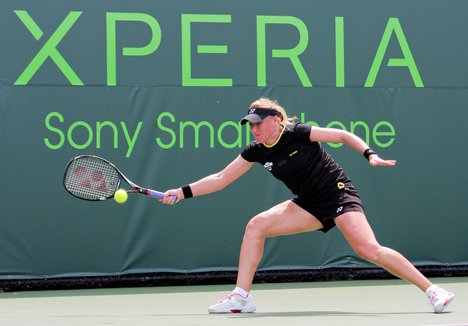 Elena Baltacha of Great Britain competes against Shaui Zhang of China during the Day 2 of qualifying rounds of the Sony Ericsson Open at Crandon Park Tennis Center on March 20, 2012 in Key Biscayne, Florida - USA.