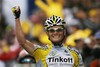 Belarus Vasil Kiryienka celebrates as he crosses the finish line to win the 19th stage of the Giro d'Italia, Tour of Italy cycling race, from Varese to Monte Pora, Friday, May 30, 2008.