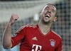 Bayern's Franck Ribery of France, celebrates after his teams second goal during the Champions League semifinal second leg soccer match between FC Barcelona and Bayern Munich at the Camp Nou stadium in Barcelona, Spain, Wednesday, May 1, 2013.