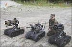 File - Foster-Miller TALON SWORDS units equipped with various weaponry. SWORDS or the Special Weapons Observation Reconnaissance Detection System, is a weaponized version being developed by Foster-Miller for the US Army.