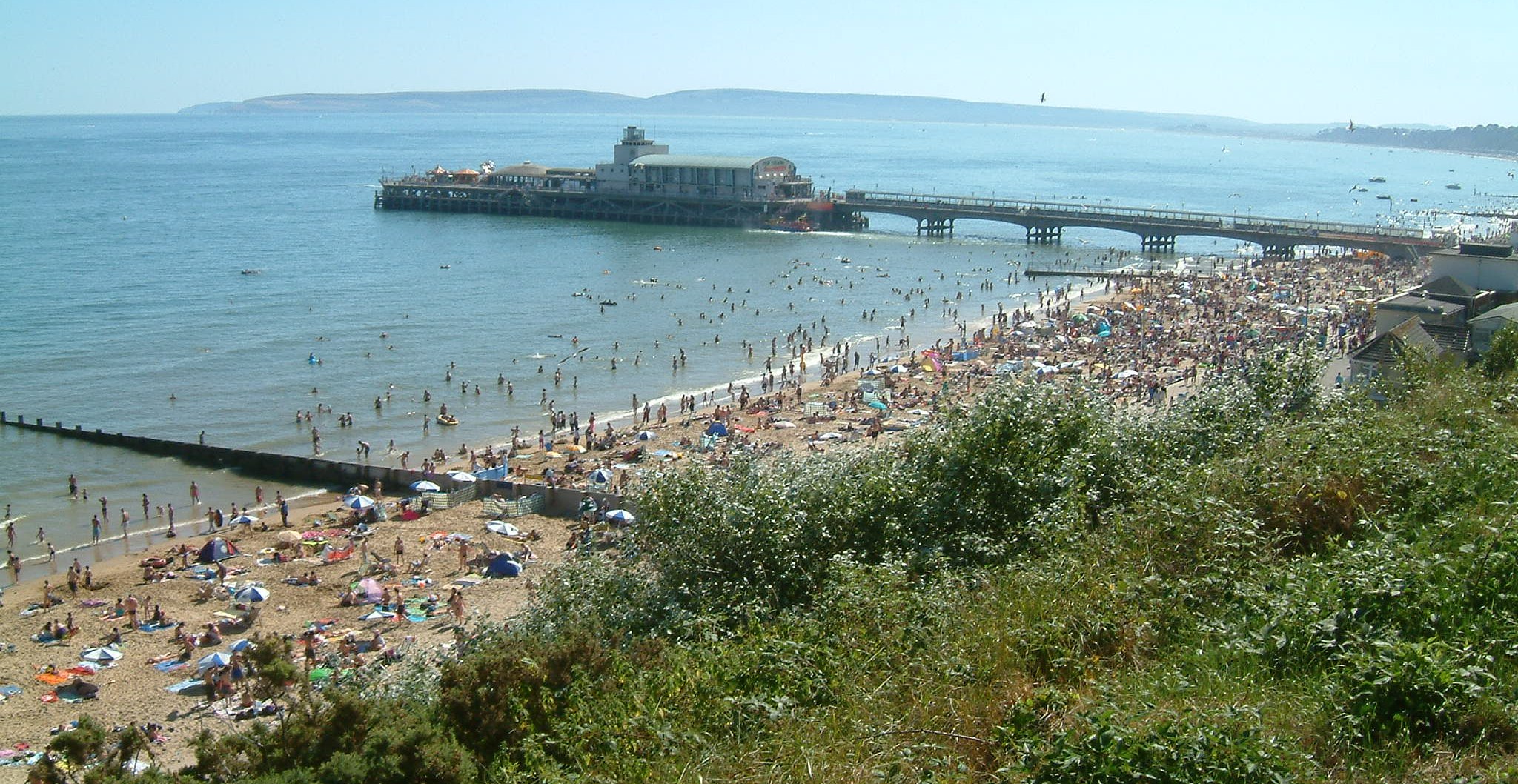  photograph of a crowded Bournemouth beach in summer