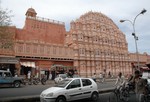 India Cycle Rickshaw Pass the Hawa Mahal in Rajasthan at Jaipur City in Northern India