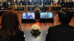 Cristina Fernández and Wen Jiabao in a videoconference with Dilma Rousseff and José Mujica. Credit: Office of the president of Argentina.