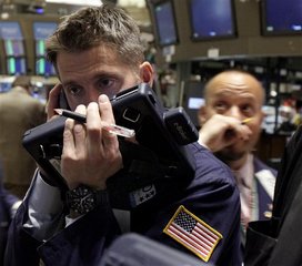 Traders work on the floor of the New York Stock Exchange Wednesday, Nov. 3, 2010.