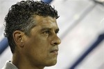 Saudi Arabia's team coach Frank Rijkaard attends his team 2014 FIFA World Cup Asia qualifying soccer match against Australia at the Prince Muhammad bin Fahd Stadium in the eastern port city of Dammam, Saudi Arabia, Tuesday, Sept. 6, 2011.