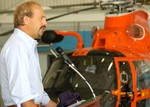 HOUSTON (Aug. 29, 2006) -- Actor Kevin Costner speaks to a crowd of Coast Guard members at Air Station Houston on Aug. 29, 2006.  The actor portrays a Coast Guard rescue swimmer in the upcoming movie, "The Guardian".  Costner, along with co-star Ashton Kutcher and director Andrew Davis, honored Coast Guard members during a ceremony marking the 1 year anniversary of Hurricane Katrina. USCG photo by PA2 Adam Eggers (106747) ( GUARDIAN (FOR RELEASE) )