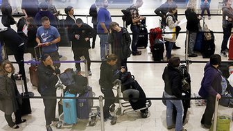 Passenger queuing to check-in