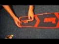 applying grip tape to a penny ''NICKEL'' board