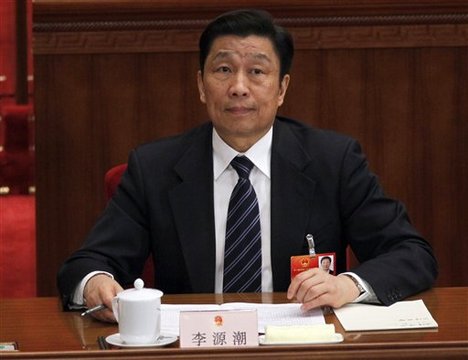 Li Yuanchao, head of the organization department of the Chinese Communist Party attends a plenary session of the National People's Congress held in Beijing, China, Friday, March 9, 2012.