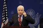 U.S. Senator John McCain talks during a press conference with Senator Lindsey Graham, not pictured, in Cairo, Egypt, Tuesday, Aug. 6, 2013.