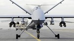 File - An armed MQ-9 Reaper unmanned aerial vehicle taxis down a runway in Afghanistan.