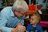 Prime Minister Kevin Rudd with Cooper enjoying his paint and Eli left when the PM visited the Amaroo Early Childhood Centre in Townsville on Tuesday 13 August 2013. Photo: Andrew Meares