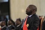 Ivory Coast incumbent President Laurent Gbagbo looks up during his swearing-in ceremony at the Presidential Palace in Abidjan, Ivory Coast, Saturday, Dec. 4, 2010.