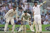 England's Ian Bell gestures to the crowd to keep still as he faces Australia's spin bowler Nathan Lyon during play on the third day of the fifth Ashes cricket Test at the Oval cricket ground in London, Friday, Aug. 23, 2013.(AP Photo/Alastair Grant)