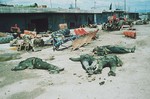 File - Bodies of Iranian Baseeje volunteer soldiers, are seen near the town of Halabja, 160 miles northeast of Baghdad, March 31, 1988. They were protesting against the chemical bomb attack on the town.