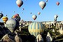 During a trip through Turkey in early May 2013, a group of us rose at 4.30 
am to take a balloon ride at dawn over the incredible landscape of 
Cappadocia's 'fairy chimneys'. 