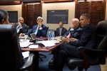 President Barack Obama meets with his National Security Staff to discuss the situation in Syria, in the Situation Room of the White House, Aug. 30, 2013.