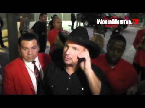 Country legend Garth Brooks surprises a lucky fan leaving Teachers Rock charity benefit