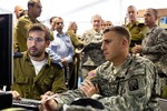 American and Israeli Soldiers work together during Austere Challenge 2012 exercise at a military installation in Israel, on Oct 30, 2012.  Austere Challenge is the largest joint exercise US has conducted with Israeli Defense Forces.  DOD photo by D. Myles Cullen