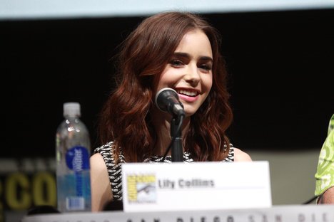 Lily Collins speaking at the 2013 San Diego Comic Con International, for "The Mortal Instruments: City of Bones", at the San Diego Convention Center in San Diego, California.