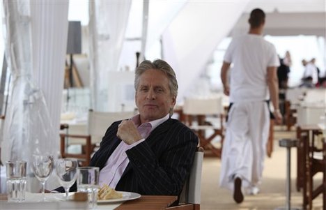 Actor Michael Douglas poses for a portrait, while promoting "Wall Street: Money Never Sleeps", at the at the 63rd international film festival, in Cannes, southern France