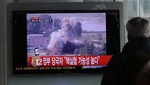 File - A South Korean man watches TV news showing file footage of the demolition of the cooling tower of the Yongbyon nuclear complex, following a report of a possible nuclear test conducted by North Korea, at the Seoul train station in Seoul, South Korea, Tuesday, Feb. 12, 2013.