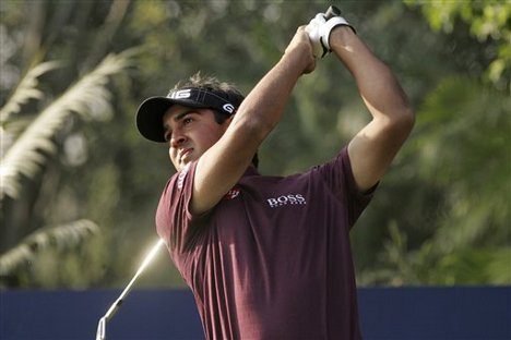 India's Shiv Kapur tees off for the 16th hole in the second round of the Johnnie Walker Classic 2008 golf tournament in Gurgaon, India, Friday, Feb. 29, 2008. 