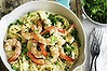 Angel hair pasta with prawn, pea and lemon sauce.