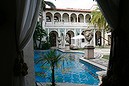 The swimming pool as seen from The Rotunda at Casa Casuarina, the former home of Italian fashion designer Gianni Versace in Miami Beach, Fla. is shown on Tuesday, Dec. 9, 2008. Before the designer's death more than a decade ago, his celebrity friends stayed so often, rooms were outfitted with them in mind. After Versace's murder and the house's sale, it become home to another mogul with A-list friends. But, slowly, 1116 Ocean Drive has opened its doors, first as an invitation-only private club, then allowing non-members to stay in its ornate rooms for prices that start at $1,200 a night, and now to the masses, or at least anyone willing to plunk down $65 for a tour. 