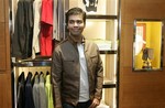 Bollywood filmmaker Karan Johar looks on during the launch of the new Dunhill store in New Delhi, India, Saturday, May 19, 2007.