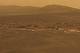A portion of the west rim of Endeavour crater sweeps southward in this view from NASA's Mars Exploration Rover Opportunity