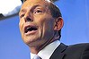 Tony Abbott, Australia's prime minister-elect, gestures as he speaks during a news conference at Parliament House in Canberra, Australia, on Monday, Sept. 16, 2013. Abbott announced his Cabinet team to see through the coalition government’s first-term pledges, attracting criticism for including just one female member. Photographer: Mark Graham/Bloomberg *** Local Caption *** Tony Abbott