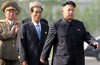 North Korean leader Kim Jong Un, right, arrives at the cemeteries of fallen fighters of the Korean People's Army (KPA) on Thursday, July 25, 2013 in Pyongyang, North Korea