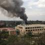 Heavy smoke rises from the Westgate Mall in Nairobi Kenya Monday Sept. 23 2013. Multiple large blasts have rocked the mall where a hostage siege is in its third day. Associated Press reporters on the scene heard multiple blasts and a barrage of gunfire. Security forces have been attempting to rescue an unknown number of hostages inside the mall held by al-Qaida-linked terrorists.  (AP Photo/ Jerome Delay)