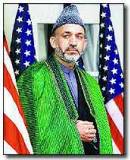 Karzai draped in American flag