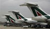 Alitalia national airline aircrafts are seen in Rome's Fiumicino intarnational airport, Italy, Friday, Sept. 12, 2008, as the company unions entered what was billed as the last round of do-or-die talks on a plan to save the company from bankrupt.