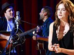 Musicians Marcus Mumford, left, and Oscar Isaac perform together with Carey Mulligan