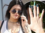 Kylie Jenner shows off a highly artistic manicure while shopping in Beverly Hills Sunday 