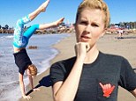 The 17-year-old showed her youth as she did handstands on the sand with her friends in Dana Point, California on Saturday.