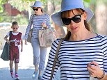 Way to go! Little Violet Affleck looks very proud while talking to loving mum Jennifer Garner following her basketball game Sunday 