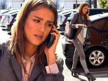 Jessica Alba is flawless in grey blazer and matching skinny jeans as she takes a business call while running errands in heading to her office