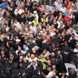 Friends or enemies? Police corral an EDL rally in Tower Hamlets