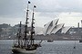 A Tall Ship sails towards the Opera House.