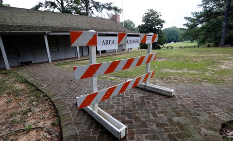 A barrier tagged with an explanatory note by the Natchez Trace Parkway in Ridgeland, Miss., on Oct. 2, 2013. 